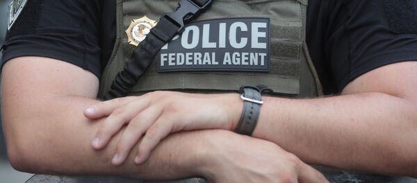 Un agente de la Policía Federal de EEUU - Sputnik Mundo