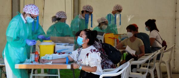Carpa en el recinto ferial de Torrejón de Ardoz para la campaña de test masivos. Carpa en el recinto ferial de Torrejón de Ardoz para la campaña de test masivos. - Sputnik Mundo