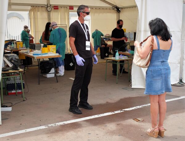 El experimento de los test masivos de COVID-19 en una ciudad de Madrid, ¿beneficioso o innecesario? El experimento de los test masivos de COVID-19 en una ciudad de Madrid, ¿beneficioso o innecesario? - Sputnik Mundo