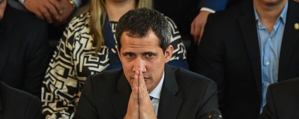 El líder de la oposición Juan Guaidó en un acto en Caracas - Sputnik Mundo