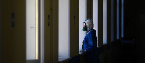 Un médico - Sputnik Mundo