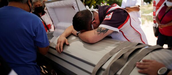 Funeral de un fallecido por COVID-19 en México - Sputnik Mundo