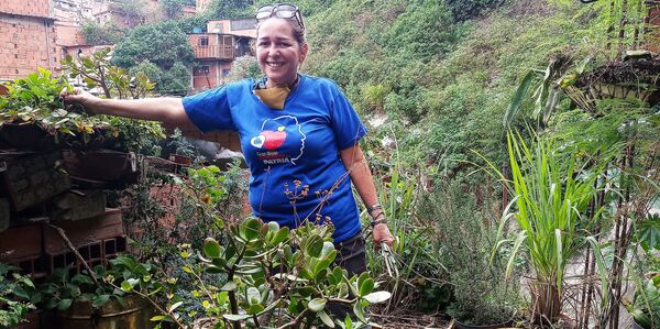 En tiempos de pandemia, las mujeres de Hogares de la Patria son un sostén de la economía popular en Venezuela En tiempos de pandemia, las mujeres de Hogares de la Patria son un sostén de la economía popular en Venezuela - Sputnik Mundo