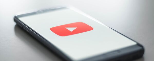 Logo de YouTube - Sputnik Mundo