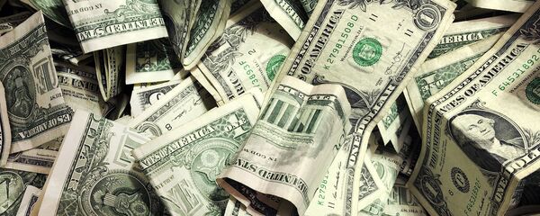 Billetes de dólares  - Sputnik Mundo