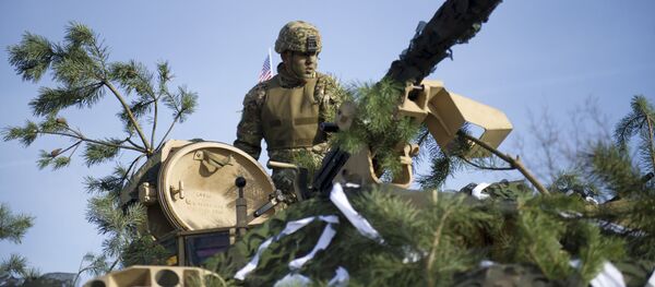 Soldado estadounidense durante unas maniobras de la OTAN en Polonia (archivo) Soldado estadounidense durante unas maniobras de la OTAN en Polonia (archivo) - Sputnik Mundo