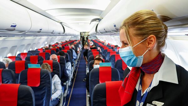 Una azafata del vuelo de Brussels Airlines (imagen referencial) - Sputnik Mundo