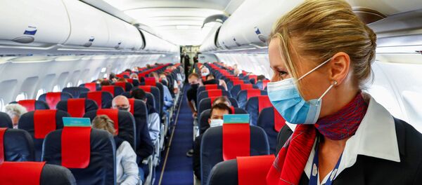 Una azafata del vuelo de Brussels Airlines (imagen referencial) - Sputnik Mundo