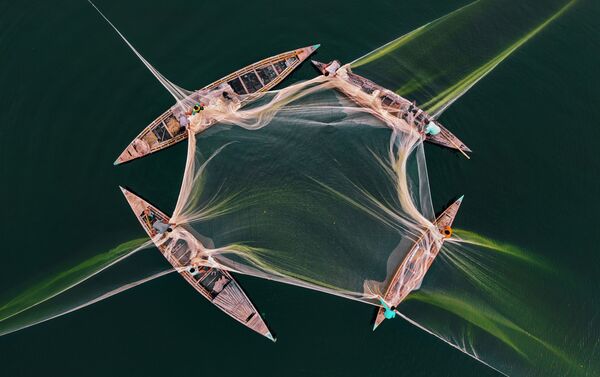 'Pesca en Jamuna' por Abdul Momin, Bangladés - Sputnik Mundo