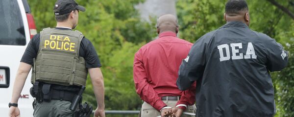 Efectivos de la DEA (Drug Enforcement Administration) de EEUU durante un operativo - Sputnik Mundo