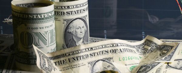 Billetes de dólares de EEUU Billetes de dólares de EEUU - Sputnik Mundo