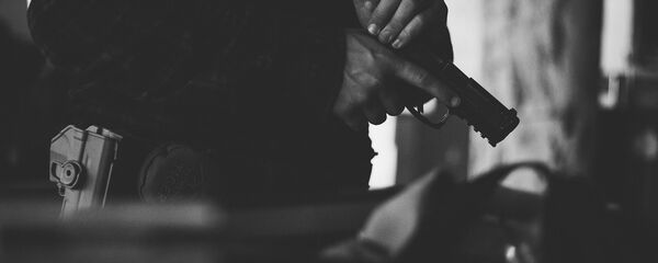 Una pistola (imagen referencial) - Sputnik Mundo