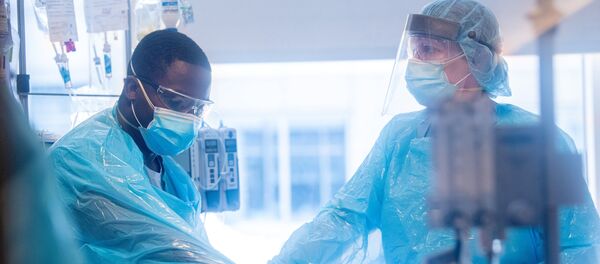 Médicos durante la pandemia de coronavirus en EEUU - Sputnik Mundo