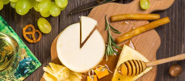 Queso, imagen referencial - Sputnik Mundo