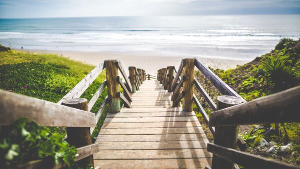 Una playa - Sputnik Mundo