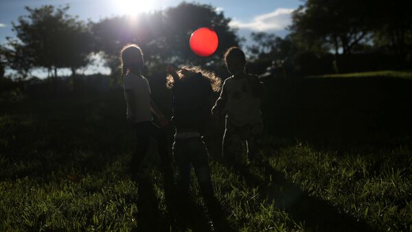 Niños migrantes (Archivo) Niños migrantes (Archivo) - Sputnik Mundo