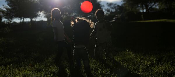 Niños migrantes (Archivo) Niños migrantes (Archivo) - Sputnik Mundo