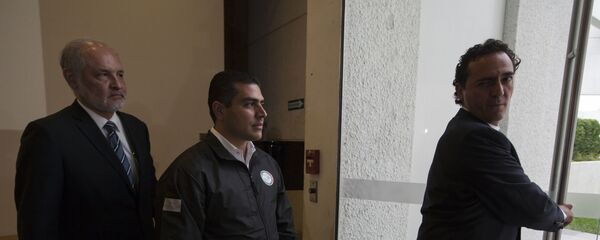 El secretario de Seguridad y Protección Ciudadana de la Ciudad de México, Omar García Harfuch (en el centro) - Sputnik Mundo