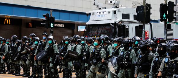 Policía en Hong Kong Policía en Hong Kong - Sputnik Mundo