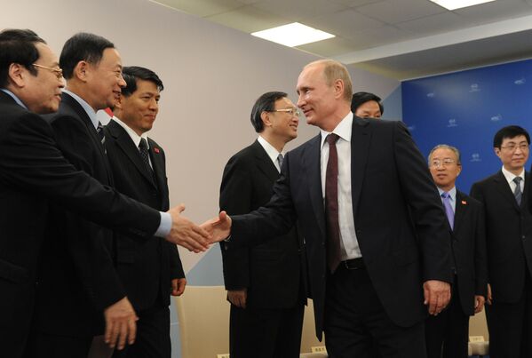  Президент России Владимир Путин во время саммита АТЭС - Sputnik Mundo