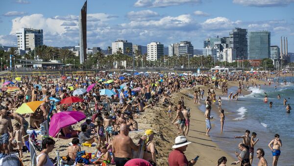 Una playa en España - Sputnik Mundo