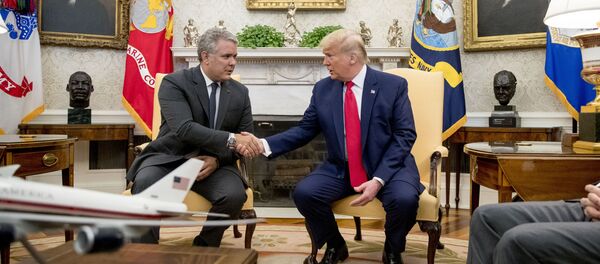 Donald Trump e Iván Duque reunidos en la Casa Blanca. Washington, 2 de marzo de 2020 - Sputnik Mundo