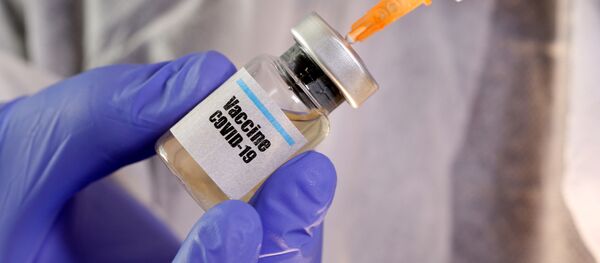 Una vacuna contra coronavirus  - Sputnik Mundo