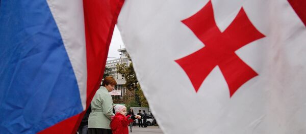 Banderas de Rusia y Georgia en el Día de la Unidad Popular - Sputnik Mundo