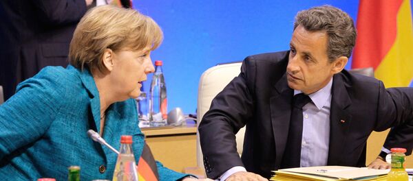 Canciller de Alemania, Angela Merkel, y ex presidente de Francia, Nicolas Sarkozy - Sputnik Mundo