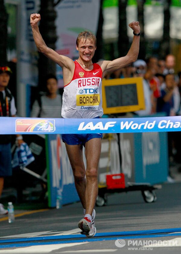 Oro y plata para Rusia en la marcha de 20 kilómetros en el Mundial de Atletismo 2011 - Sputnik Mundo