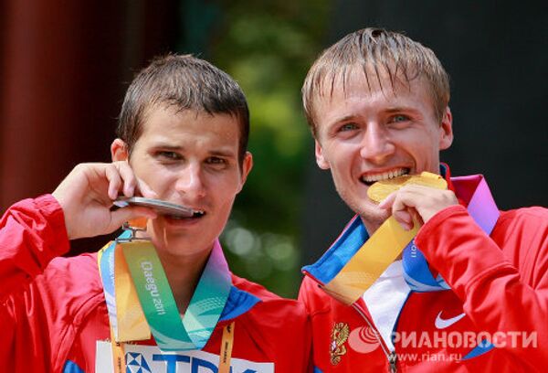 Oro y plata para Rusia en la marcha de 20 kilómetros en el Mundial de Atletismo 2011 - Sputnik Mundo