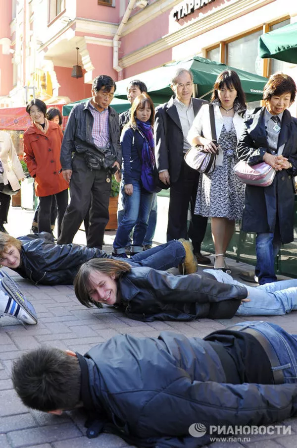 Aficionados al ‘planking’ realizan un flashmob en Moscú Aficionados al ‘planking’ realizan un flashmob en Moscú - Sputnik Mundo