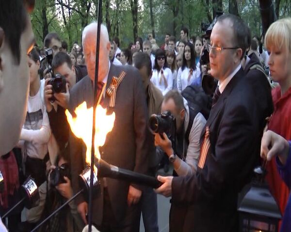 Marcha de Antorchas en Moscú en homenaje a los veteranos de guerra - Sputnik Mundo