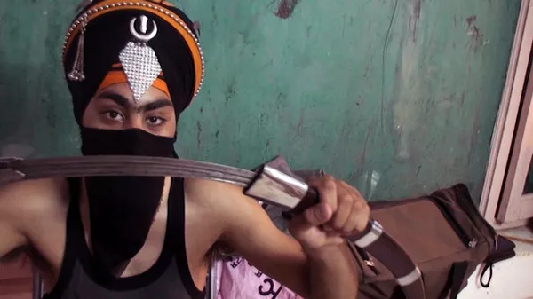 Los guerreros Sikhs saben masticar vidrio y partir cocos en la cabeza - Sputnik Mundo