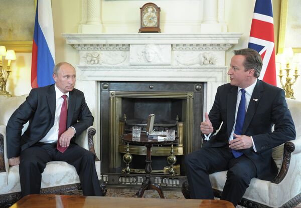 Vladímir Putin y David Cameron (archivo) - Sputnik Mundo