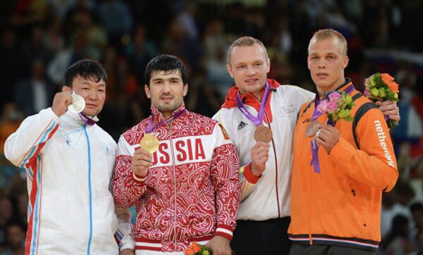 Judoca Taguir Jaibuláev, ganador del tercer oro olímpico de Rusia en Londres 2012 - Sputnik Mundo