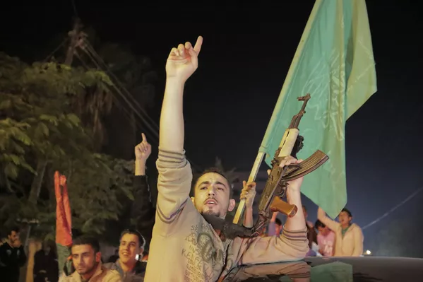 Los palestinos celebran la tregua con Israel en la Franja de Gaza Los palestinos celebran la tregua con Israel en la Franja de Gaza - Sputnik Mundo