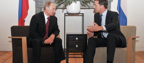 El presidente ruso Vladímir Putin con el primer ministro holandés, Mark Rutte - Sputnik Mundo