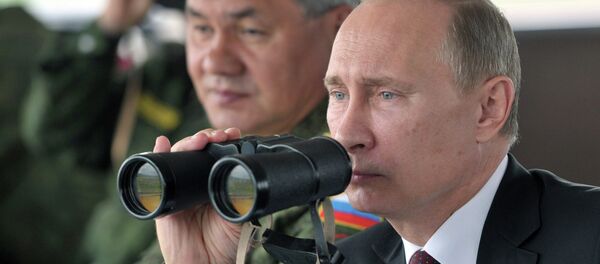 Presidente de Rusia, Vladímir Putin, y el ministro de Defensa, Serguéi Shoigú - Sputnik Mundo