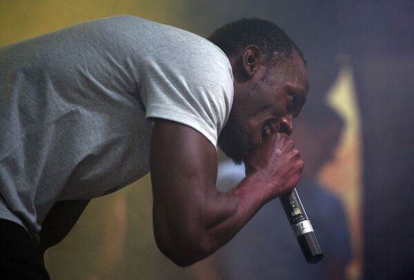 El pentacampeón mundial Usain Bolt en una fiesta jamaiquina en Moscú - Sputnik Mundo