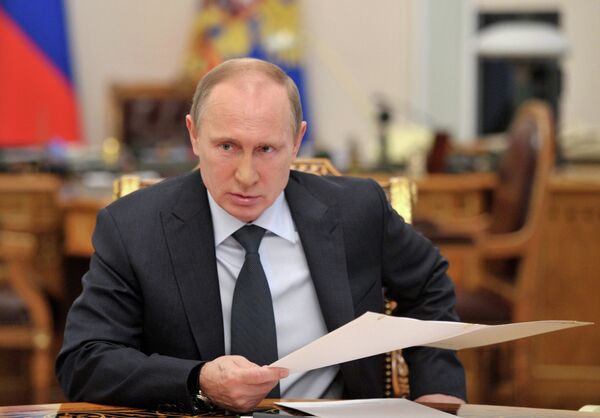 El presidente Vladímir Putin durante la reunión con los miembros del Consejo de Seguridad de Rusia - Sputnik Mundo