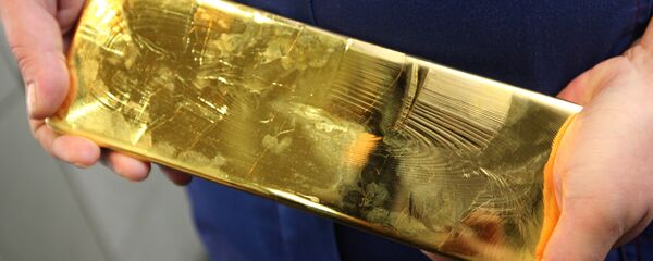 Un lingote de oro (archivo) Un lingote de oro (archivo) - Sputnik Mundo