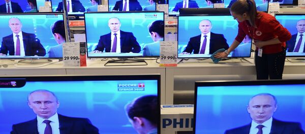 Televisores en una tienda moscovita - Sputnik Mundo