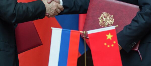 Banderas de Rusia y China - Sputnik Mundo