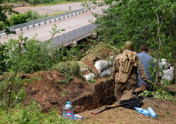 La Guardia Nacional ucraniana niega su participación en el fusilamiento de heridos - Sputnik Mundo