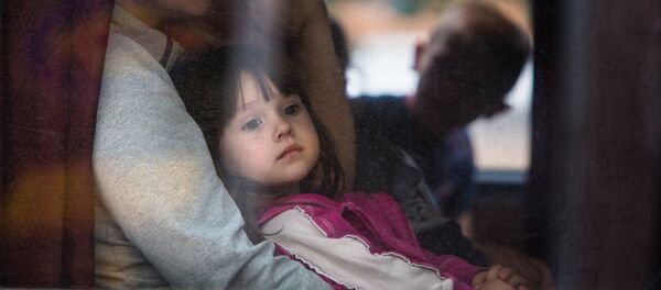 Desplazados ucranianos (archivo) - Sputnik Mundo