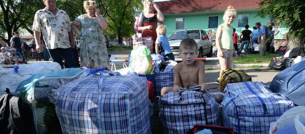 Refugiados de Donbás Refugiados de Donbás - Sputnik Mundo