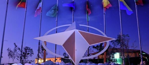 Banderas de los países miembros de la OTAN - Sputnik Mundo