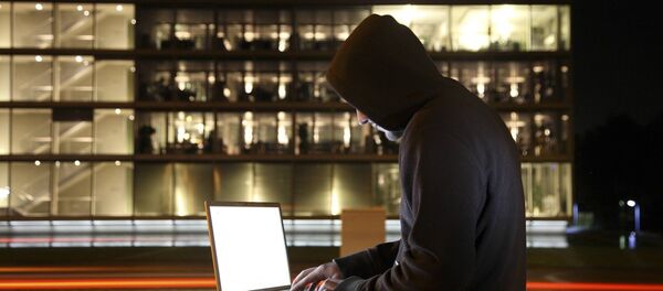 Un hacker (archivo) Un hacker (archivo) - Sputnik Mundo