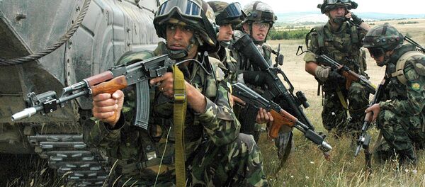 La OTAN refuerza su presencia militar en Lituania con soldados húngaros - Sputnik Mundo